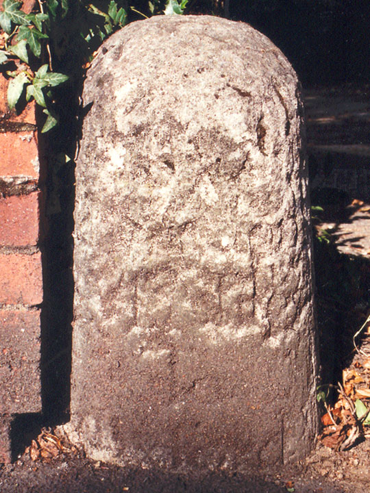 Milestone outside 243 Woodstock Road